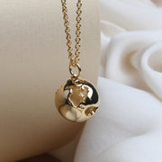 Globe Necklace by Cristina Ramella